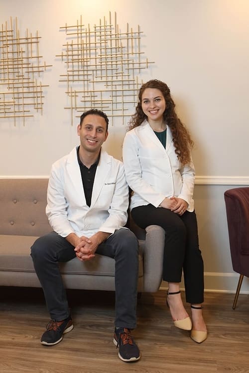 Dr. Ziad Adham and Dr. Hiba Alqasemi Sitting in Beyond Dentistry Office
