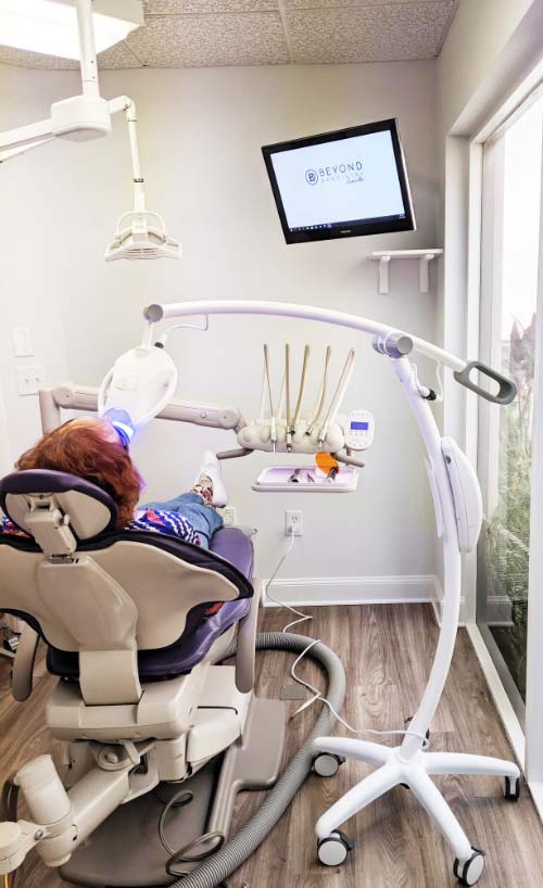 dental patient sitting in dental office